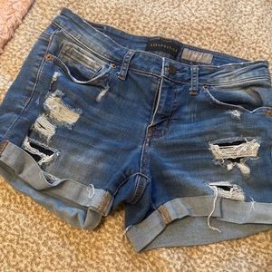 Distressed midi shorts